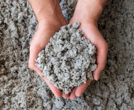 Cupped-Hands-Full-of-Cellulose-Insulation