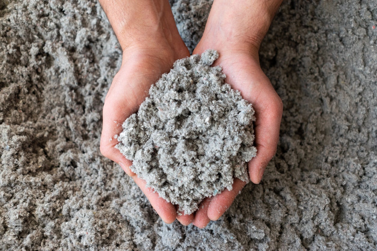 Cupped-Hands-Full-of-Cellulose-Insulation